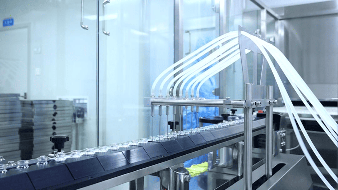 Industrial pharmaceutical production line with stainless steel equipment