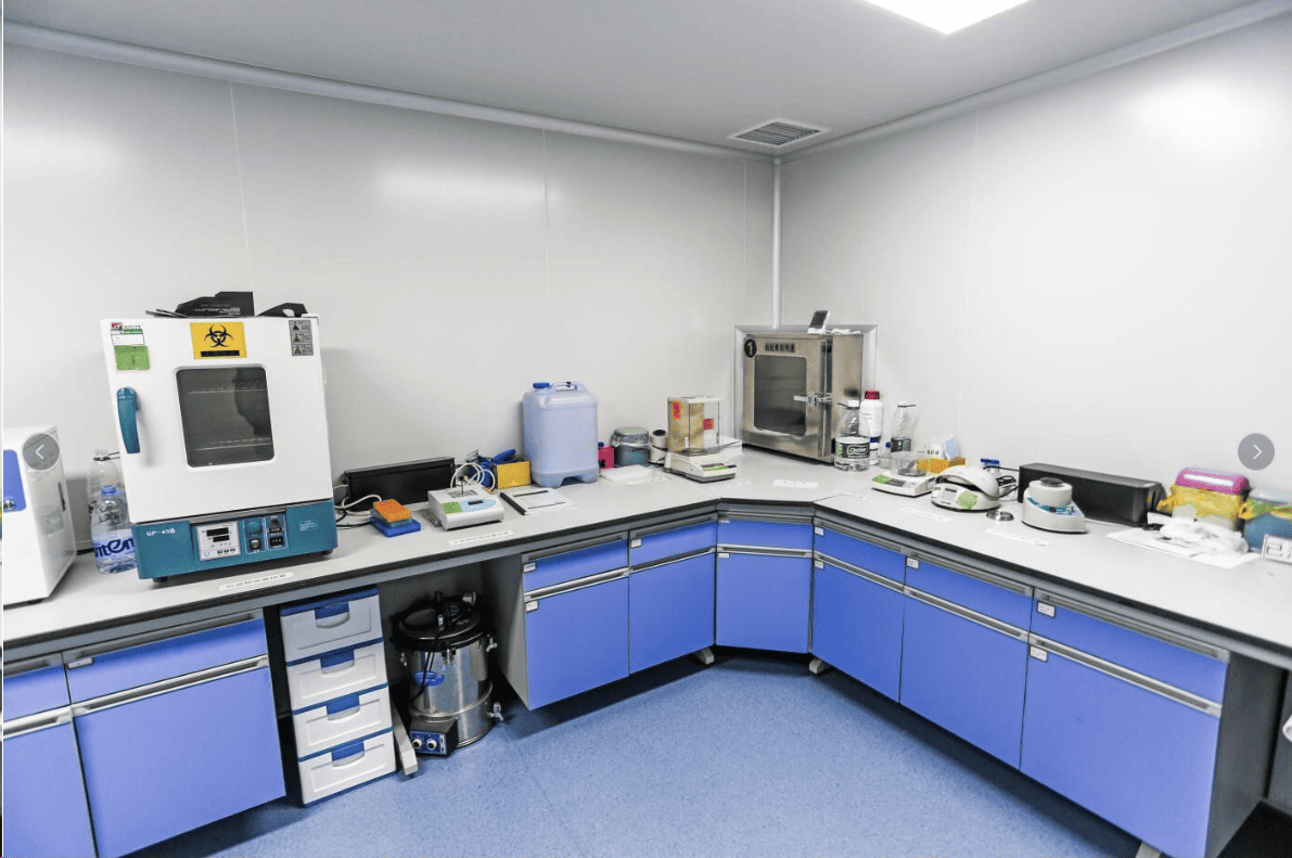 Laboratory technician conducting tests with scientific equipment